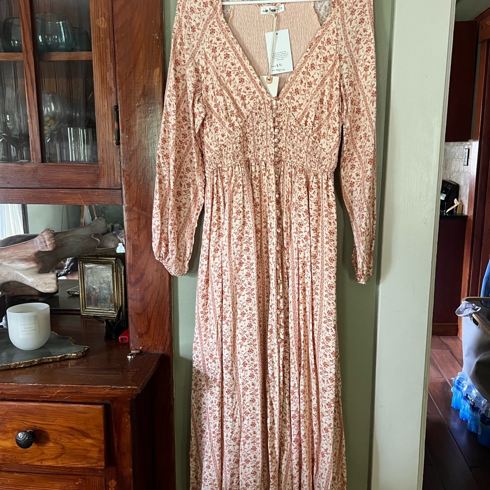 Boutique long sleeved maxi dress with buttons